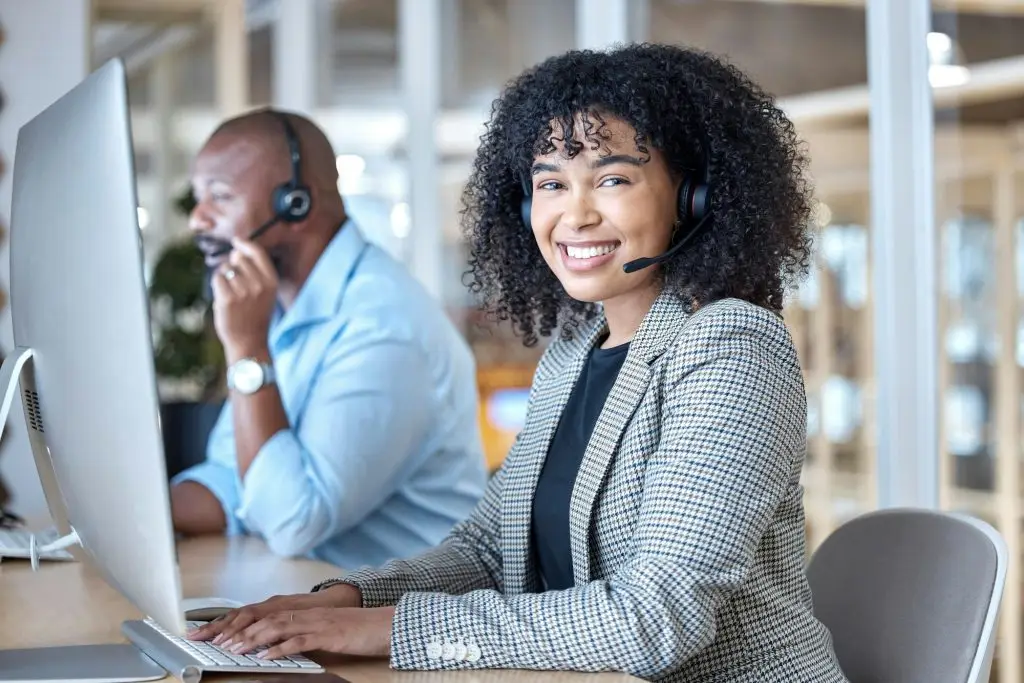 Call center, woman and portrait of consultant at computer for customer service, business support or